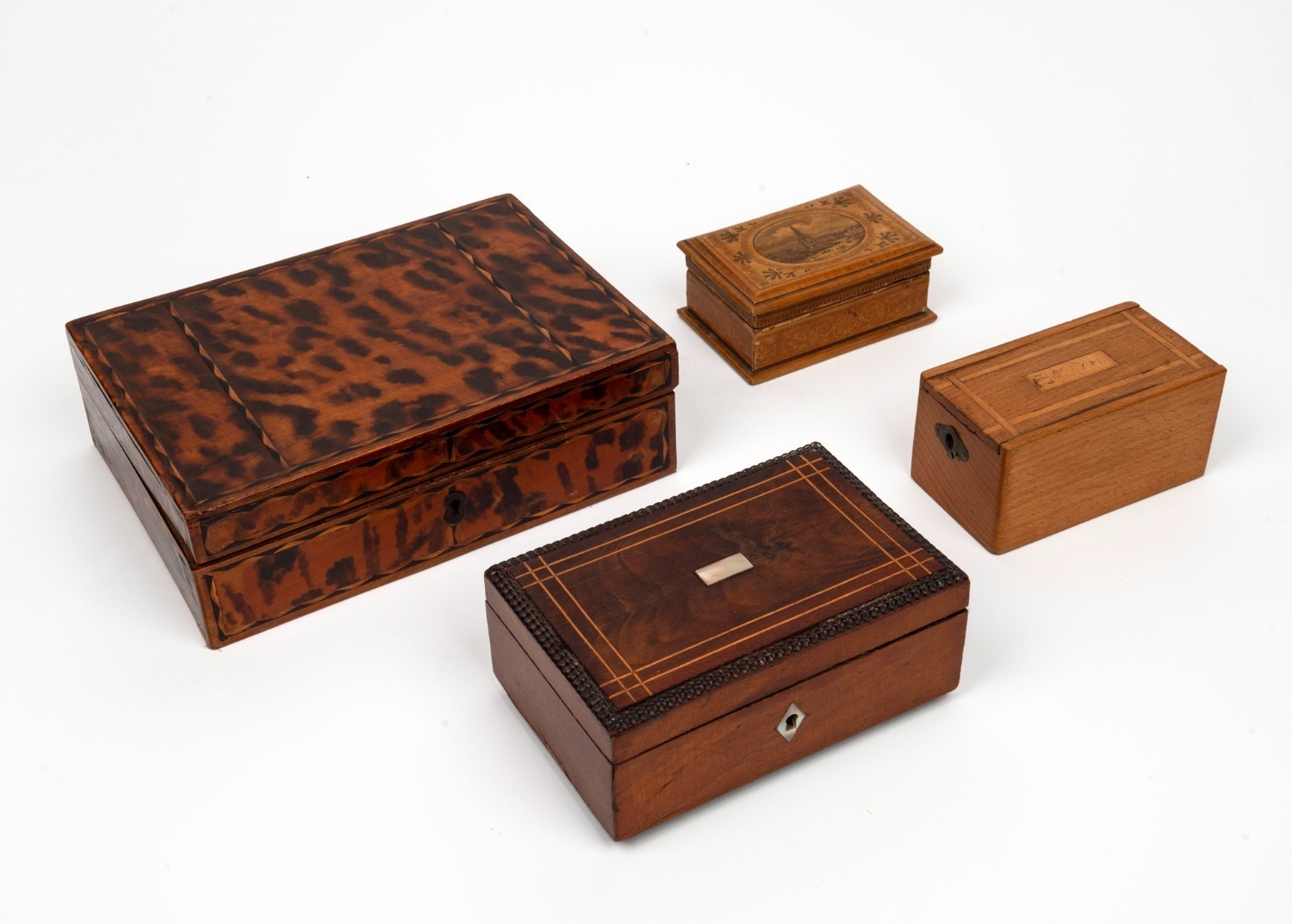 Four assorted antique timber boxes, comprising of a faux tortoiseshell ...