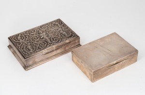 A Siamese silver cigarette box with timber lining and repousse decoration to the lid; together with an antique English sterling silver cigarette box (also with timber lining) by William Hutton & Sons of Birmingham, circa 1907, (2 items), 16cm and 13cm wid