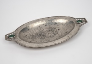 An antique Chinese pewter serving bowl with carved jade decoration, early 20th century, 52cm wide.