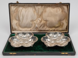 A pair of antique sterling silver sweetmeat dishes, housed in original plush fitted velvet lined leather box, made in Birmingham, circa 1901, ​​​​​​​the dishes 19.5cm wide, 348 grams total.