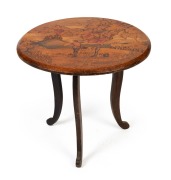 An Australian pokerwork circular occasional table with Medieval landscape scene with figures in castle, circa 1925, 54cm high, 60cm diameter