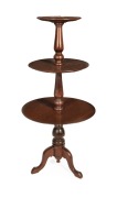 An antique Australian cedar three tier circular dumb waiter, 115cm high