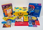Sydney 2000 Olympics official case containing a large quantity of Olympics memorabilia, including full set of 120 Centennial Olympic Games trading cards, Herald Sun 2000 Olympic Gold Medallist Collection (complete), Sydney 2000 socks and cheerband, Herald