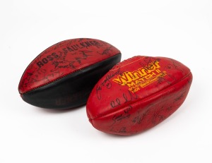 ESSENDON FOOTBALL CLUB, two vintage red and black footballs with team signatures.