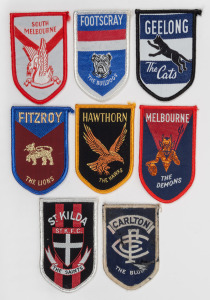 circa 1960s shield-shaped cloth patches for Carlton, Fitzroy, Footscray, Geelong, Hawthorn, Melbourne, South Melbourne, and Saint Kilda. (8).