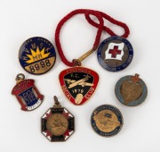 BADGES & FOBS: including 1918 University Carnival, 1931-32 MCC Membership, V.R.C. 1939-40 Membership, 1979 Essendon F.C. and 3 others (non-sport). (Total: 7 items).