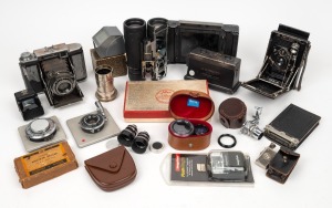 VARIOUS MANUFACTURERS: A diverse accumulation of more than twenty camera items, mostly accessories, but also lenses and one Ehira camera.