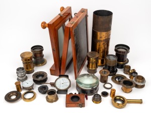 An accumulation of nine c. 1890s brass lenses of varying size, together with twenty lens elements of similar vintage, plus three other related items.