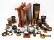 An accumulation of nine c. 1890s brass lenses of varying size, together with twenty lens elements of similar vintage, plus three other related items.