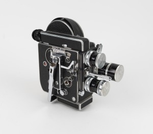 BOLEX-PAILLARD: H16 Reflex 16mm movie camera [#239669] with Switar 10mm f1.6/Switar 16mm f1.8/Macro-Switar 26mm f1.1 lenses, all three Kern Paillard lens caps, one lens hood, and two viewfinder attachments, c. 1956.