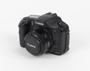 CANON: EOS 10D digital SLR camera with EF II 50mm f1.8 lens, Canon lens cap, and Inca battery pack, c. 2003.