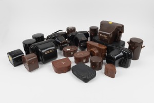 CANON: An accumulation of twenty Canon-branded leather camera, lens, and accessory cases, from many different eras. (20 items)