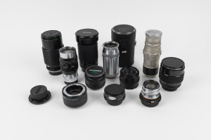 VARIOUS MANUFACTURERS: Group of eleven camera lenses from brands such as Makinon, Soligor, Tamron, and Vivitar, many with front and rear lens caps. (11 items)
