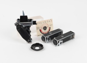 BOLEX-PAILLARD: Group of five camera accessories, comprising one Bolex "C" Adapter, one pistol grip, two viewfinders, and one exposure table. (5 items)