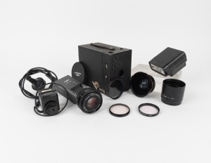 VARIOUS MANUFACTURERS: An accumulation of nine camera accessories including Nikon Series E 50mm f1.8 lens, plus Kodak No. 2A Brownie. (10 items)