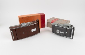 POLAROID: Group of two instant cameras, both in maker's boxes with instruction booklets - one Land Camera Model 95 (the first-ever Polaroid instant camera model), together with one Highlander Model 80 Land Camera. (2 items)