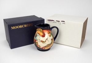 MOORCROFT "Shoal" English pottery jug on dark blue ground, in original box of issue, circa 2006, impressed factory mark and artist details to base, 11.5cm high