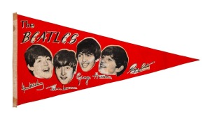 THE BEATLES: Rare 1964 pennant flag with photos of Paul, John, George, and Ringo and facsimile signatures below their images. 8.5 x 16.5cm
