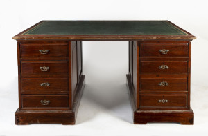 An antique ash twin pedestal desk, late 19th century, 77cm high, 154cm wide, 100cm deep.