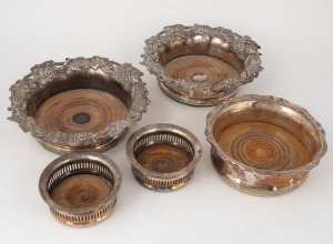 Five assorted antique silver plated and old Sheffield plate wine coasters, 18/19th century, the largest 19cm wide