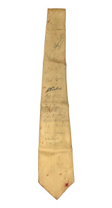 ESSENDONS 1949 and 1950 PREMIERSHIPS: A gold-coloured silk tie bearing the original signatures of 15 Essendon players, mostly members of the teams that won the back-to-back premierships. Noted Dick Reynolds, Alan Dale, Bob Syme, John Coleman, Norm McDona
