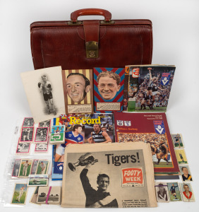 Various items, including a 1941 original signed photograph of "Kid Young", the Australian featherweight champion, various part-sets of cigarette and other trade cards (mainly football and cricket), two Argus 1953 Football Portraits (John Kennedy and Alan Ruthven), the 1967 Richmond Premiership edition of Footy Week, and several 1970s to 1990s Finals Series Football Records, etc., all in leather briefcase.