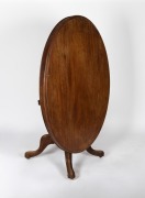 An antique mahogany tilt-top oval supper table, 19th century, 72cm high, 135cm wide, 101cm deep - 2