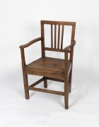 A rustic antique English elm and beech carver chair with peg joint construction, 18th century, 57cm across the arms