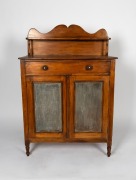An antique Australian kauri pine meatsafe with zinc panels to the sides and doors, South Australian origin, 19th century, 140cm high, 90cm wide, 41cm deep