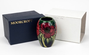MOORCROFT "Anemone" English pottery tribute vase on green and blue ground, in original box of issue, circa 2002, impressed factory mark and artist details to base, 13cm high