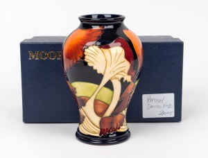 MOORCROFT "Parasol Dance" English baluster shaped pottery vase with mushroom decoration on dark blue ground, in original box of issue, circa 2005, impressed factory mark and artist details to base, 16cm high