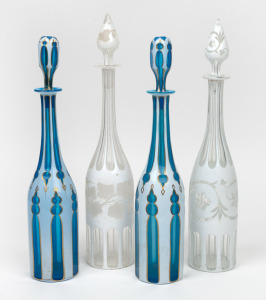 Two pairs of antique overlaid glass decanters in blue and white, Bohemian origin, mid 19th century, A/F 37cm and 39cm high