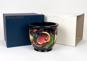 MOORCROFT "Queen's Choice" English pottery jardiniere on dark blue ground, in original box of issue, circa 2000, impressed factory mark and artist details to base, 17cm high