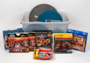 SUPER -8 REELS: Remainder lot of fourteen titles including Grease, The Longest Yard, and Star Trek The Motion Picture, together with fifteen other reels of varying size, vintage, and subject.