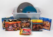 SUPER -8 REELS: Remainder lot of fourteen titles including Grease, The Longest Yard, and Star Trek The Motion Picture, together with fifteen other reels of varying size, vintage, and subject.