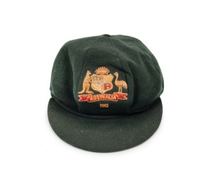 NORMAN O'NEILL'S AUSTRALIAN TEST TEAM 1961 BAGGY GREEN CAP with "Farmers" label in the crown; "2/61" and "N. O'NEILL" typed on the label; green wool, embroidered Australian Coat-of-Arms and the date "1961" to the front panel. (a little dirty or faded). 