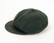 NORMAN O'NEILL'S AUSTRALIAN TEST TEAM 1961 BAGGY GREEN CAP with "Farmers" label in the crown; "2/61" and "N. O'NEILL" typed on the label; green wool, embroidered Australian Coat-of-Arms and the date "1961" to the front panel. (a little dirty or faded). - 3