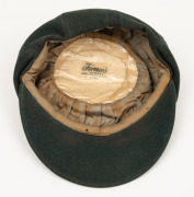 NORMAN O'NEILL'S AUSTRALIAN TEST TEAM 1961 BAGGY GREEN CAP with "Farmers" label in the crown; "2/61" and "N. O'NEILL" typed on the label; green wool, embroidered Australian Coat-of-Arms and the date "1961" to the front panel. (a little dirty or faded). - 6