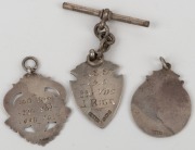 STAWELL GIFT RUNNING RACE: Trophy, likely EPNS, inscribed 'Stawell Jubilee 1927 - 400 Yds Hcp - Won by E.J. Ride (Edwin James Ride)', height 28cm including plinth, plus three small c. 1918 sterling silver race medallions, the three of them 18 grams total. - 3