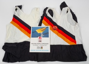 1990 WORLD ROWING CHAMPIONSHIPS: Two rowing unisuits with flag colours of East Germany, one with hammer and compass Communist motif patch, together with Souvenir Programme. Achieving significant success that year, the East German team was permitted to com