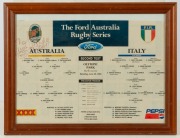 A souvenir Australian rugby team jersey signed by the team, attractively framed and glazed; together with a program from the Australia Vs. Italy second Test, June 25th, 1994, (2 items), ​​​​​​​the larger 87 x 104cm overall - 2