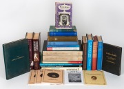 A shelf of cricket books including The Bradman Albums, W.G. Grace by Bernard Darwin, Cricket Country by Edmund Lunden, Days In The Sun by Neville Cardus, W.G. Grace - A Life by Simon Rae, Bradman's Invincibles by Roland Perry, Cricket Books - Great Collec
