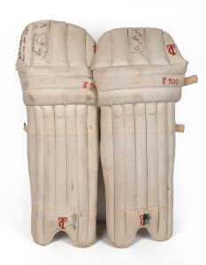 A pair of TC-500 full-sized match-worn cricket pads, endorsed 'TO LARRY, YOU ARE A BETTER BLOKE THAN KAPIL DEV, KEEP SMILING, DEAN JONES'; the second pad endorsed 'TO LARRY, BEST WISHES, DEAN JONES'.