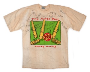 1994 ASHES TOUR 'DOWN UNDER': A Tetley tea souvenir tee-shirt with screen-printed logo on front and test fixtures on back, signed by fifteen members of the touring party.