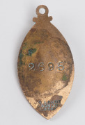 A Melbourne Cricket Club membership fob for 1902-3, made by Gaunt, bronze metal incorporating the MCC cypher; and with the impressed number "2695" verso. Without the distinctive red, white and blue enamel, this may be an error or a prototype. - 2