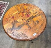 An Australian pokerwork circular occasional table with Medieval landscape scene with figures in castle, circa 1925, 54cm high, 60cm diameter - 4