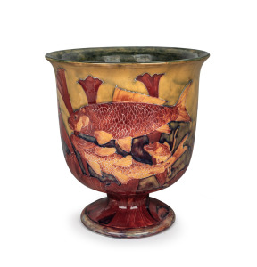 MOORCROFT "Flambe Carp" rare English pottery urn vase finely decorated with six carp amongst waterweed, highlighted in flambe glaze, impressed "Moorcroft, Burslem" with underglazed full green signature "W. Moorcroft", 27cm high, 25.5cm diameter.