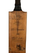 THE AUSTRALIAN TEAM IN ENGLAND 1938: A W.M. Woodfull Australia XI Dominion cricket bat, signed to the front of the blade by the Australian team, including Don Bradman, Stan McCabe, Jack Fingleton, Bill O'Reilly, and Sid Barnes. Additionally signed on the - 3