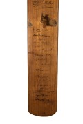 THE AUSTRALIAN TEAM IN ENGLAND 1938: A W.M. Woodfull Australia XI Dominion cricket bat, signed to the front of the blade by the Australian team, including Don Bradman, Stan McCabe, Jack Fingleton, Bill O'Reilly, and Sid Barnes. Additionally signed on the - 4