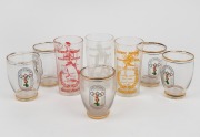 Three 1956 Greig's Honey glasses, featuring John Landy, Shirley Strickland, and Faith Leech, together with five gold-trimmed drinking glasses featuring the official Melbourne 1956 logo. (8 items)